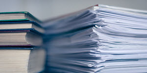 stack of books and papers