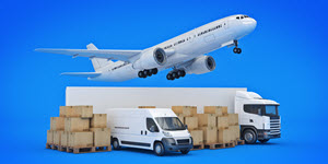 aeroplane taking off, parked trailer, van and moving boxes