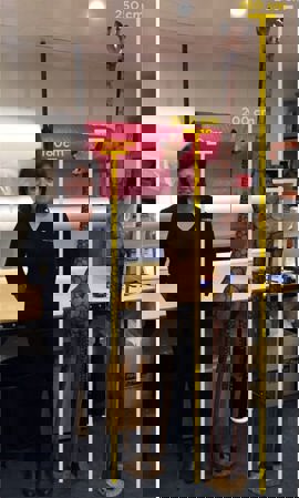 How do you get a giraffe into a box?